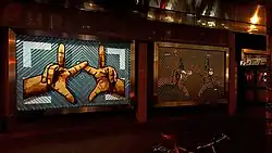 Zwei gekreuzte Hände-Street-Art-Kunstwerk aus Packband