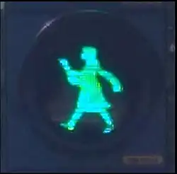 Gänseliesel (mit Gans im Arm) auf einer Fußgängerampel in Monheim am Rhein