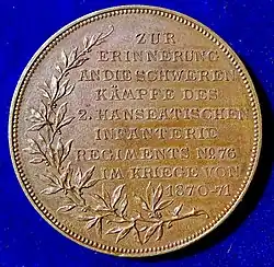 Die Rückseite dieser Medaille.