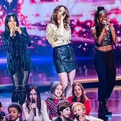 Emily Intsiful (rechts) mit Nena und Larissa Kerner (v.&nbsp;l.&nbsp;n.&nbsp;r.)