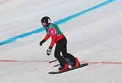 Chái Xīn beim Team-Ski-Snowboard-Cross-Wettbewerb