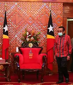 Abbildung eines Uma Lulik auf dem Stuhl des Staatspräsidenten