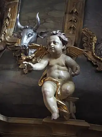 Kanzelkorb mit Putte und Stierkopf