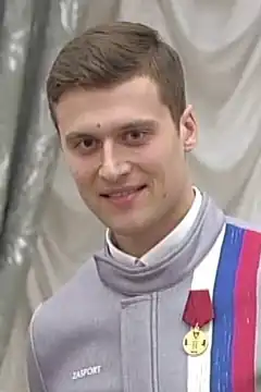 Alexander Enbert beim Empfang Wladimir Putins nach den Olympischen Winterspielen 2018.
