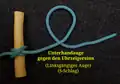 „Unterhandauge gegen den Uhrzeigersinn“ (linksgängig). Von der stehenden Part (links) verläuft das Arbeitsende im Uhrzeigersinn nach links unten.
