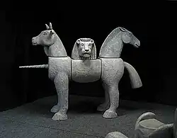 Aus den Einzelteilen zusammengesetzte Figur