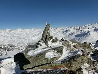 Steinmann auf dem Piz Surparé.