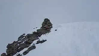 Steinmann auf dem Piz Turba