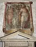 Eingang zur San Silvestro-Kapelle der Basilika SS. Quattro Coronati in Rom mit den vier gekrönten Märtyrern