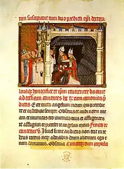 Karl V. empfängt vor seiner Salbung in seinem Schlafgemach den Erzbischof von Reims und den Bischof von Beauvais, die ihn zur Kathedrale geleiten sollen. Buchmalerei in der 1365 angefertigten Handschrift London, British Library, Cotton Tiberius B. VIII, fol. 44v