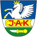 Wappen von Komňa (deutsch Komna), Tschechien („Jan Amos Komenský“)