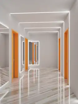 Insbesondere in schmalen Fluren kann es sinnvoll sein, Spiegel in das Lichtdesign einzubinden.