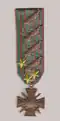 Croix de guerre mit vier Palmenzweigen und drei vergoldeten Sternen