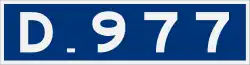 D977