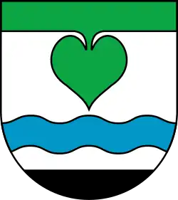 In einem grünen Lindenblatt ausgezogenes Schildhaupt im Wappen von Amt Elsterland