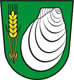 Wappen von Bad Sassendorf-Enkesen im Klei mit Kreidemuschel (Inoceramus lamarcki)
