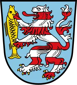 Bunter Löwe hält einen Fisch (Wesertal)