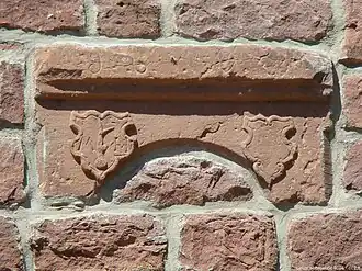 Wappenstein am alten Schulhaus