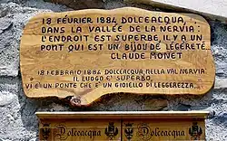 Hinweistafel, dass Claude Monet 1884 hier war