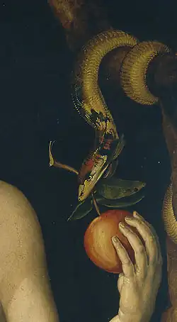 Die Schlange überreicht Eva den Apfel