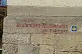 Inschrift am Haus Karlsplatz 27