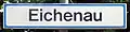 Haltepunkt Eichenau, Schild im Design der 1980er/90er Jahre mit verkehrsblauem Rand