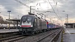 Ankunft des Alpen-Express in Emmerich, gebildet aus Wagen der BTE. Bis Emmerich war BTE betriebsführendes EVU.