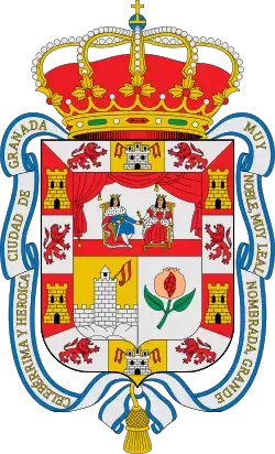 teilgeöffneter naturfarbener Granatapfel im Wappen von Granada