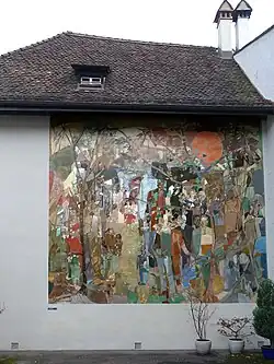 Kunstkredit Basel-Stadt. 1. Preis für das Fassadenbild, Rückwand des Sigristenhauses im Hof des Humanistischen Gymnasiums, Basel. 1946–1953, Le Chant de l’Occident von Ernst Stocker, Coghuf (1905–1976)