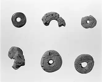 Bernsteinperlen, Grab D19