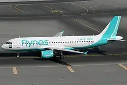 Flynas A320-200 VP-CXR DXB 2014-11-22