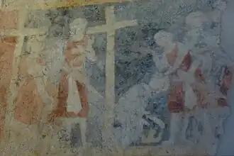 Heraklius legt seine Krone ab, um das Kreuz in die Stadt tragen zu können.