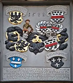 Wappenstein des Peter V. Nagel von Dirmstein und seiner Gattin Katharina Kratz von Scharfenstein, mit dem Allianz- und zwei Ahnenwappen. Nagelscher Hof, Freinsheim, 1588