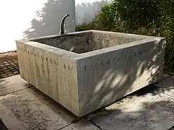 Gedenkbrunnen für Theophil Roniger, Magden, Christkatholische Kirche St. Martin