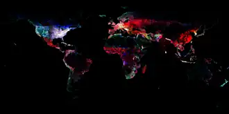 Weltkarte mit Geonames Einträgen: Blau sind Flüsse und Seen (Hydrological, “H” code), rot sind Städte und Siedlungen (populated, “P” code), grün sind Berge und Täler (topological, “T” code), grau sind andere Landmarken (Stand: 2011)