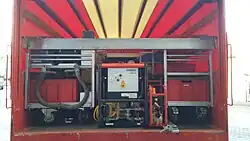 Reihe an Ladebordwagen mit Stromerzeuger inkl. Zubehör, Durchlauferhitzer, Trinkwasserpumpe und Wagen mit wasserführenden Armaturen