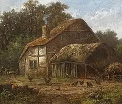 Heuschuppen mit Hühnern im Vordergrund