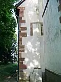 Nordwestecke Langhaus, Eckquaderung mit aufgemauerter Erhöhung