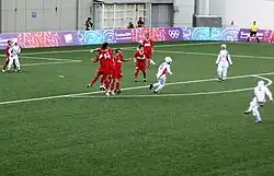 Szene aus dem Spiel um Bronze 2010 zwischen Türkei (rot) und den Iranerinnen