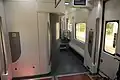 Innenraum eines auf Nieder­flur­einstieg umgebauten Mittelwagens