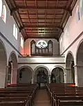 Blick nach Westen zur Orgelempore und Rosette