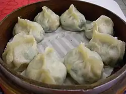 „Schnittknob­lauch-Teig­ta­sche“[Anm. 11], Taipeh 2006