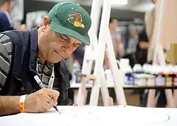 Photo einer Person, die zeichnet