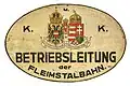 Schild der k.u.k Betriebsleitung der Fleimstalbahn