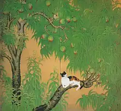 Katze auf dem Pfirsichbaum