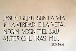 Surselvischer biblischer Wandspruch: "Jesus spricht: Ich bin der Weg und die Wahrheit und das Leben. Niemand kommt zum Vater als nur durch mich."