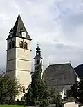 Links der Turm der Liebfrauenkirche (14.&nbsp;Jh.), rechts die Pfarrkirche „Zum Heiligen Andreas“