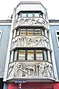 Hausfassade für den Architekten Zeytinoglu und die Caritas in der Adolf-Kolping-Gasse in Klagenfurt