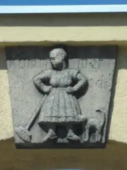 Reichenbach (Eulengeb.) - Zwei Reliefs: (l.) Uf Heem zu! (Auf dem Weg nach Hause) (r.) Komm mer ock! (Komm mir nur! (Mit dem Finger drohend.))