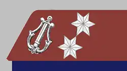 Korporäle der Re­gi­ments­mu­sik eines In­fan­te­rie­re­gi­ments mit rot­brau­ner Ega­lisie­rung